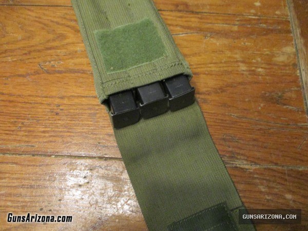 UZI pouch Action Arms and (3) 32 round magazines IMI