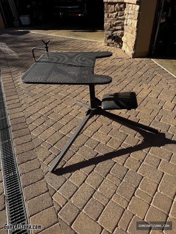 Metal shooting table w seat that swivels for hunting or long range shooting