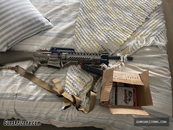 VR 60 tactical 12 gauge semi model shotgun like new a lot of add-ons plus shells