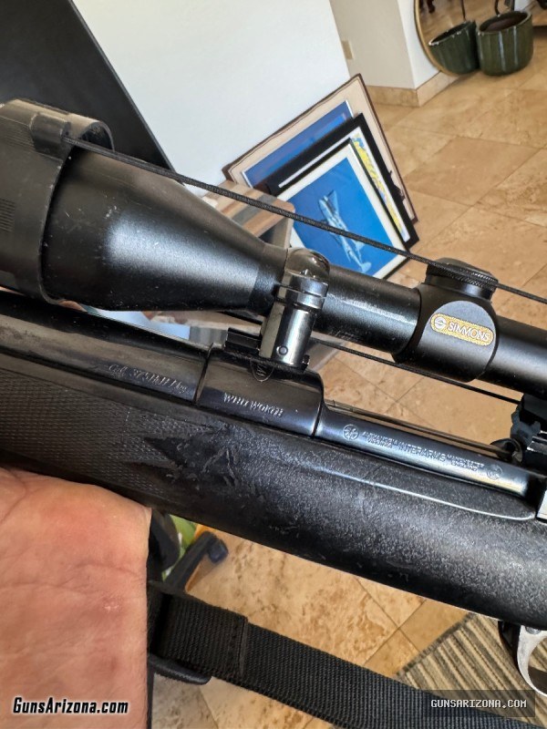 375 H&H Mag with 3-10 Simmons Scope.