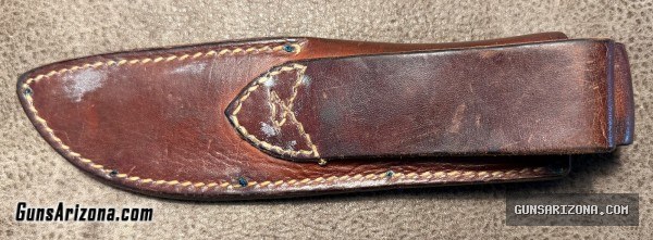 R.H. Ruana & Rifle $1000