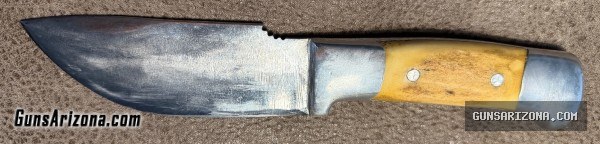 R.H. Ruana & Rifle $1000