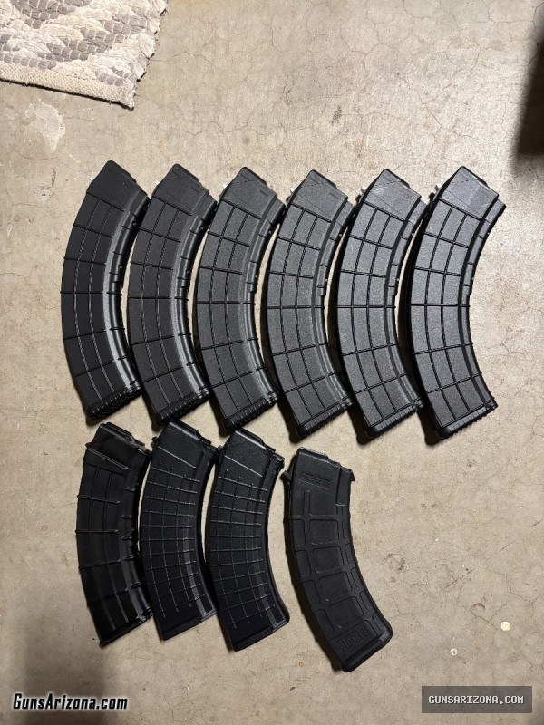 Magazines (AK, PPK), assorted parts/accessories (M1 Garand, AR-15, NVG, Tripod)