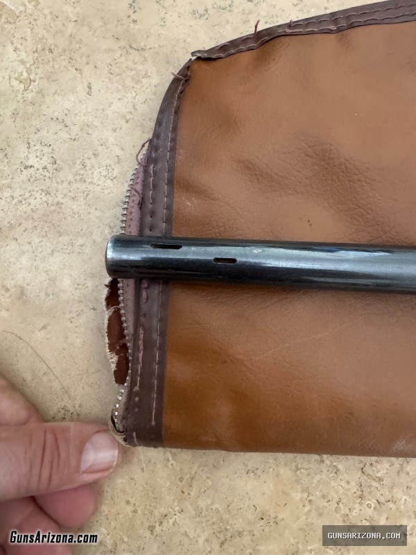 375 H&H Mag with 3-10 Simmons Scope.