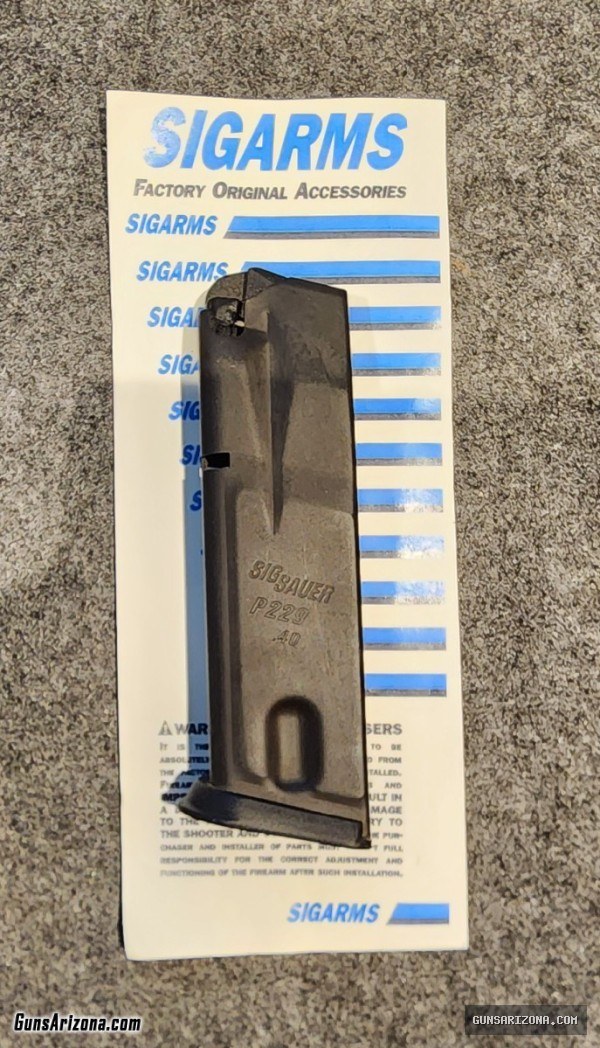 Two Sig Sauer P229 .40 S&W, .357 SIG 12-round magazines