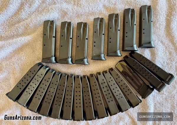 TWO Sig Sauer SP2022 pistols with lots of extras