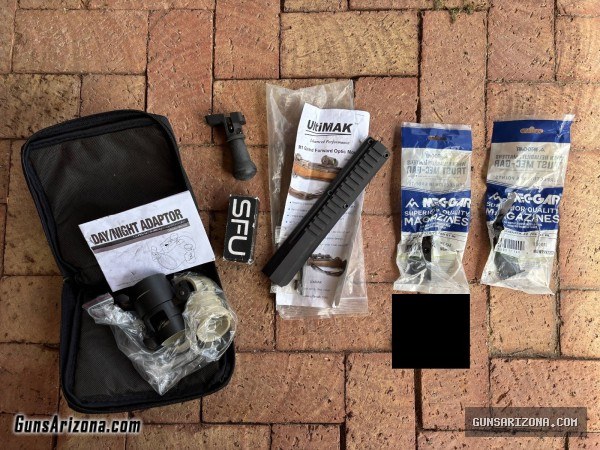 Magazines (AK, PPK), assorted parts/accessories (M1 Garand, AR-15, NVG, Tripod)