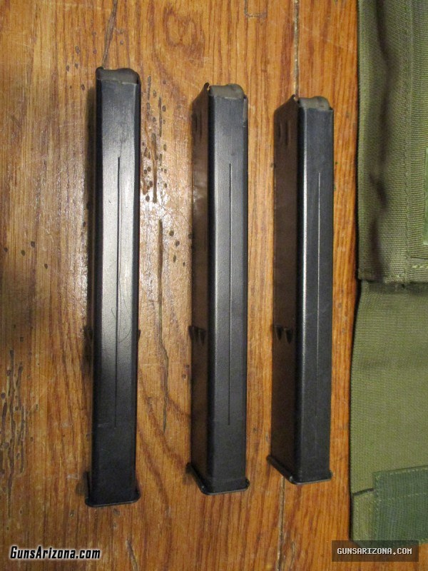UZI pouch Action Arms and (3) 32 round magazines IMI