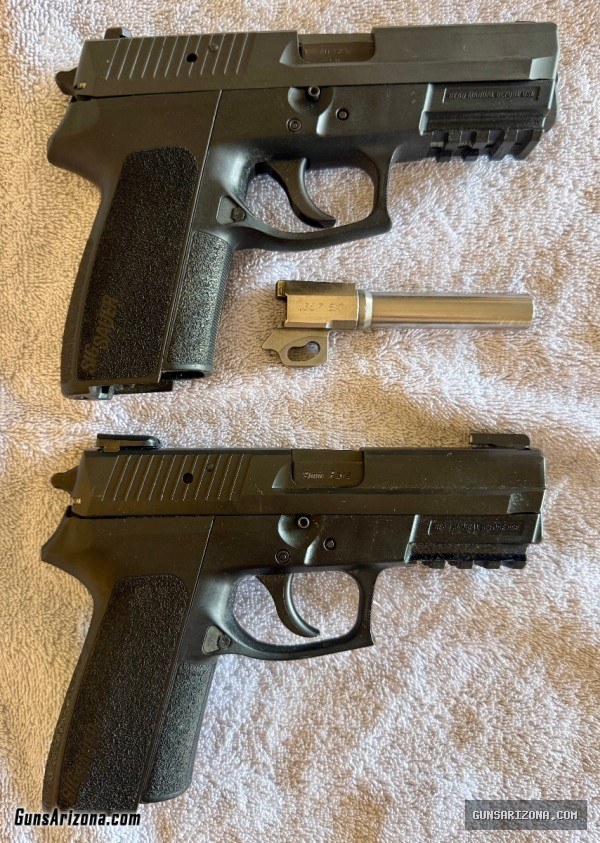 TWO Sig Sauer SP2022 pistols with lots of extras