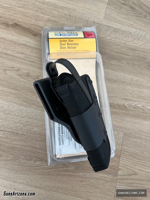 Uncle Mike’s Jacket Slot Dual Retention Duty Holster LH Size 2