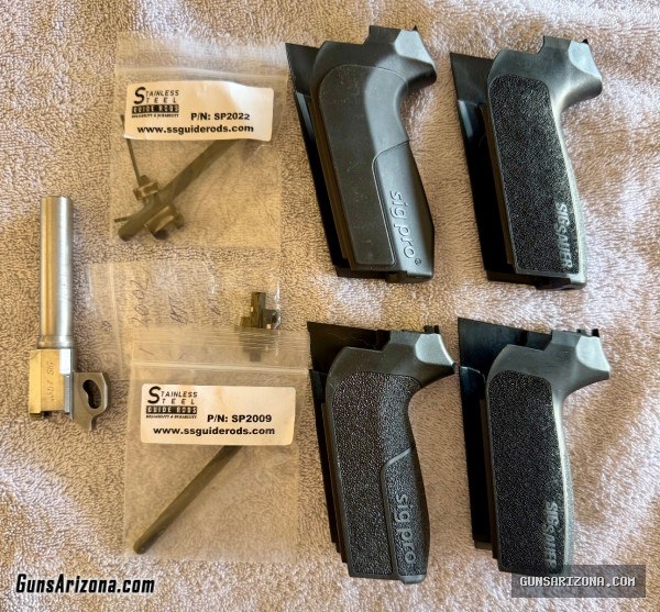 TWO Sig Sauer SP2022 pistols with lots of extras