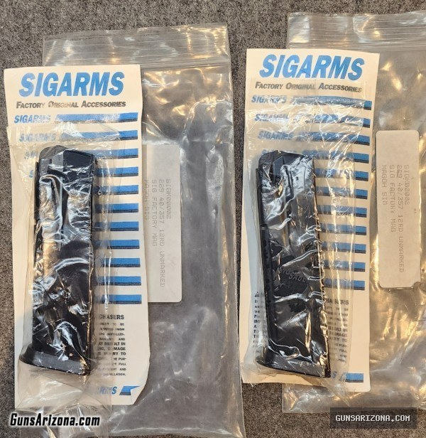 Two Sig Sauer P229 .40 S&W, .357 SIG 12-round magazines